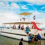 Private catamaran in Tortuga Island sailing in clear waters